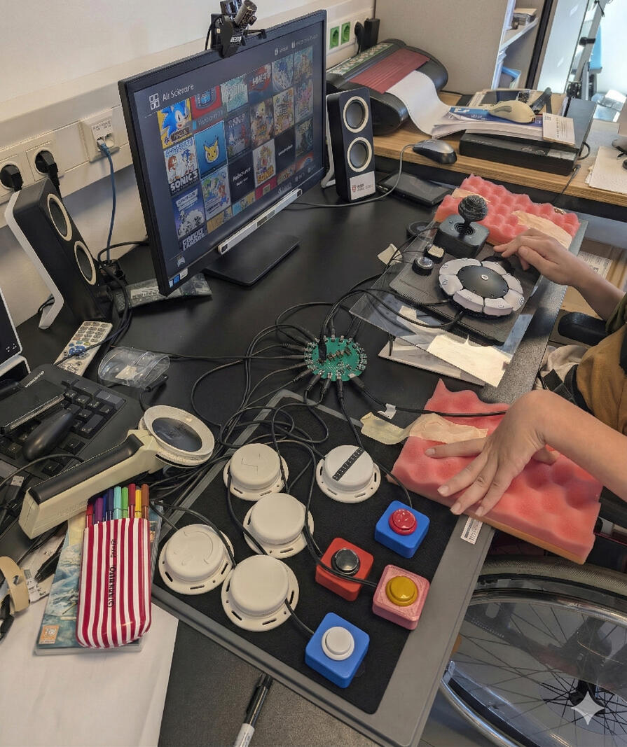 Play testing of customized controller. User with cerebral palsy play testing their Sony Access Controller fitted with custom attachments.
