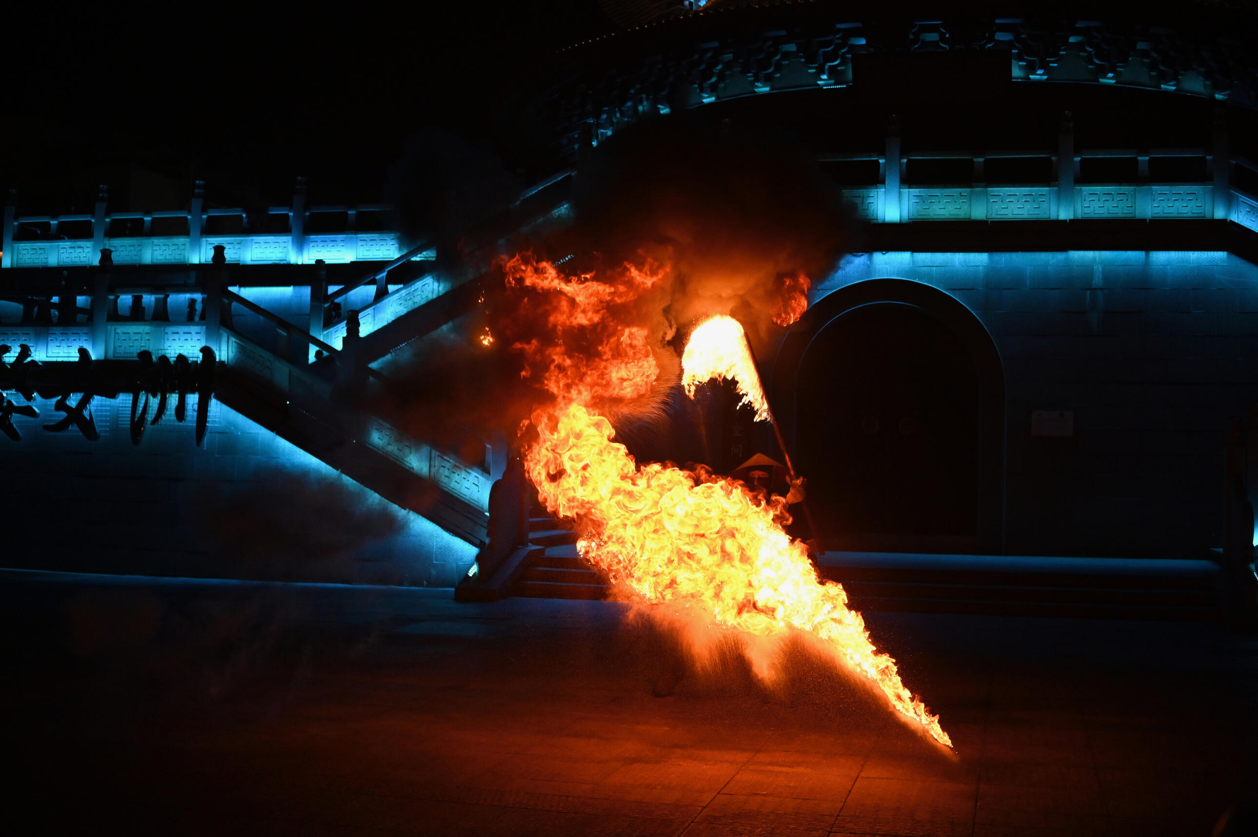 A picture of someone performing the fire sword dance.